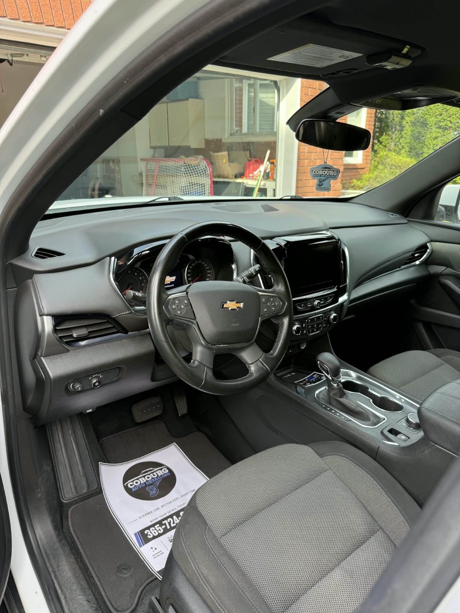 Chevrolet interior with clean cloth seats and dashboard