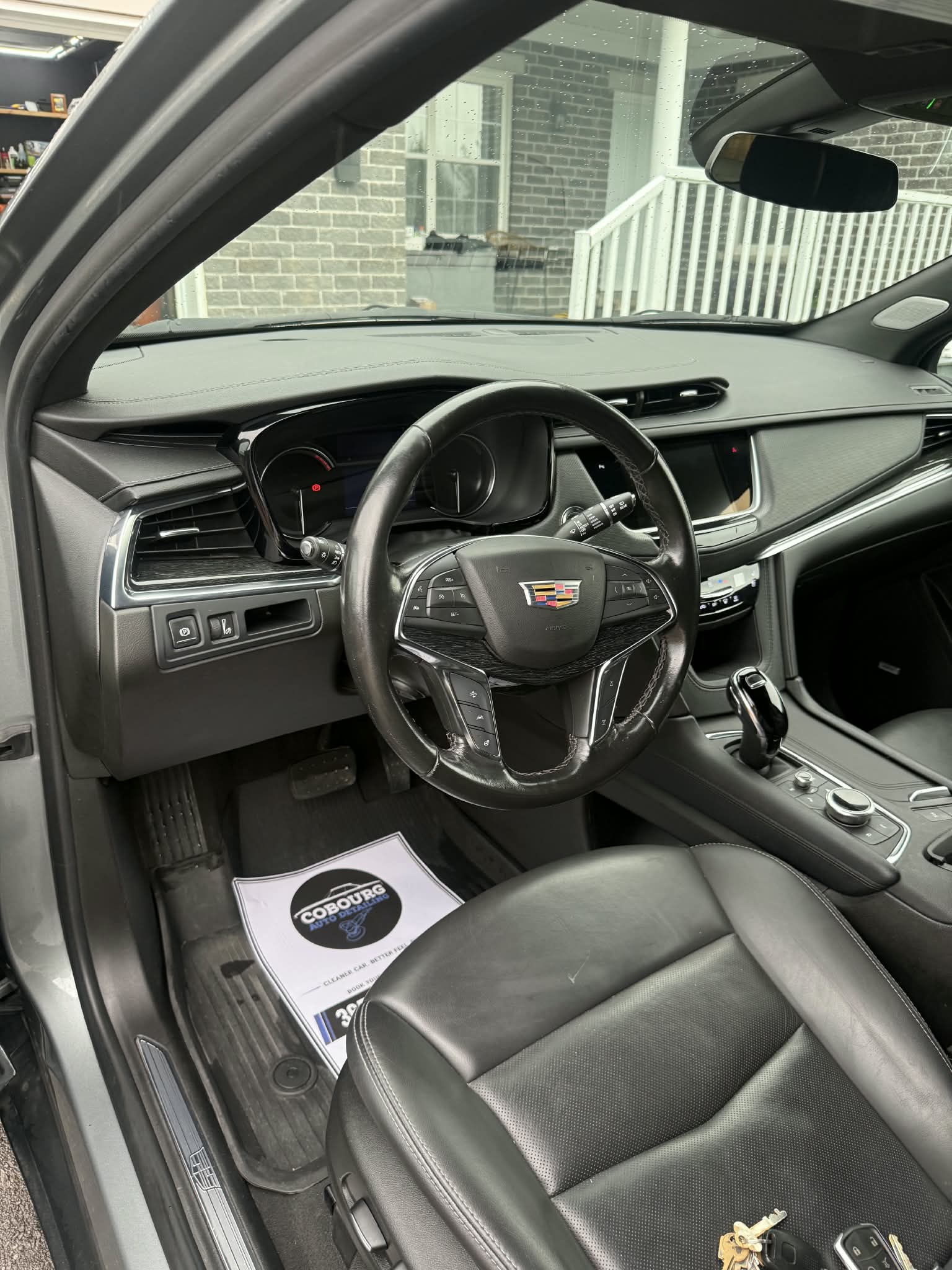 Cadillac front cabin with leather seats and detailed dashboard