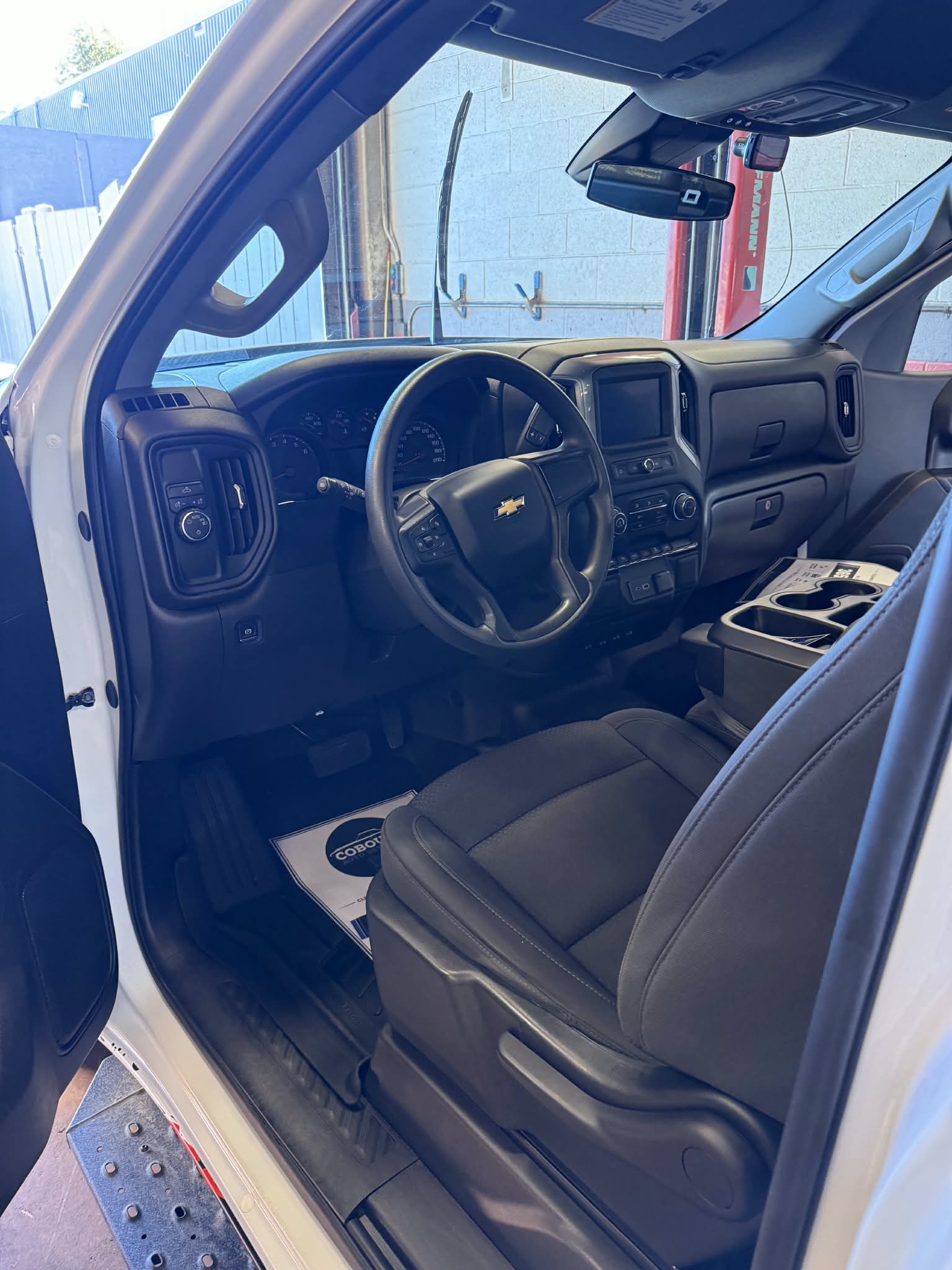 Chevrolet pickup cabin with leather front seat and center console