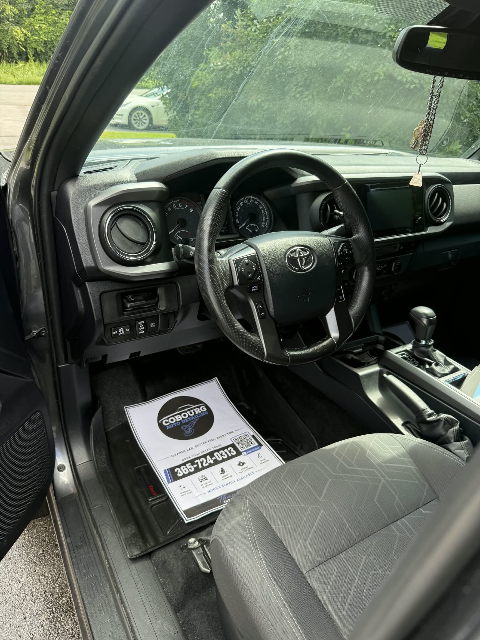 Toyota cabin with clean front seat, dashboard, and center console