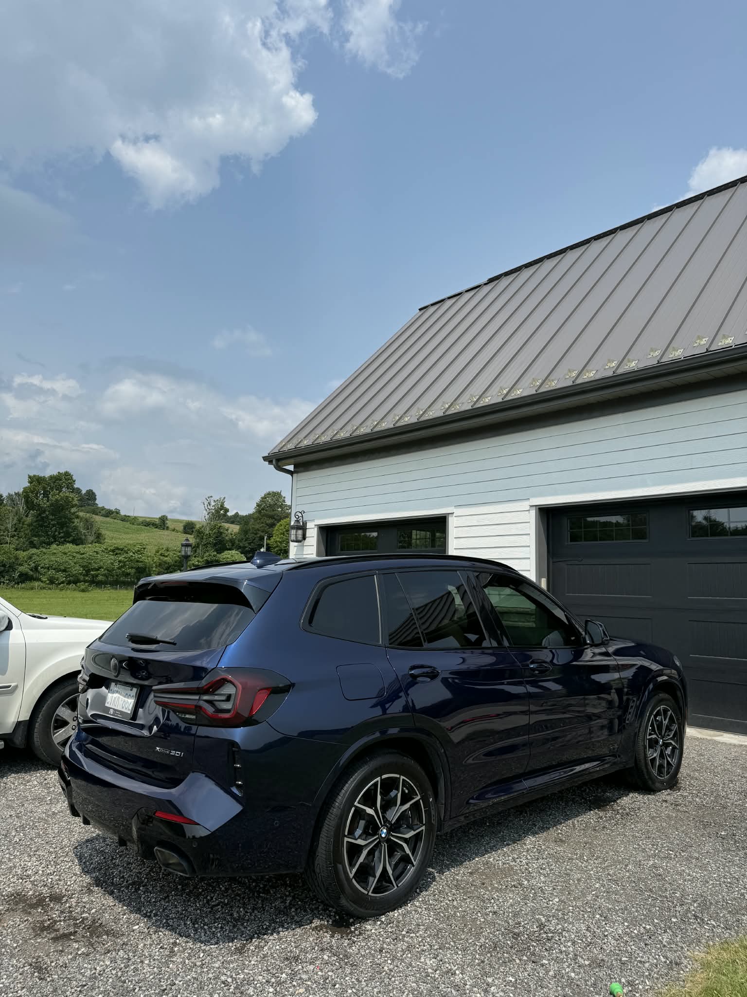 Dark blue SUV parked outside after detailing