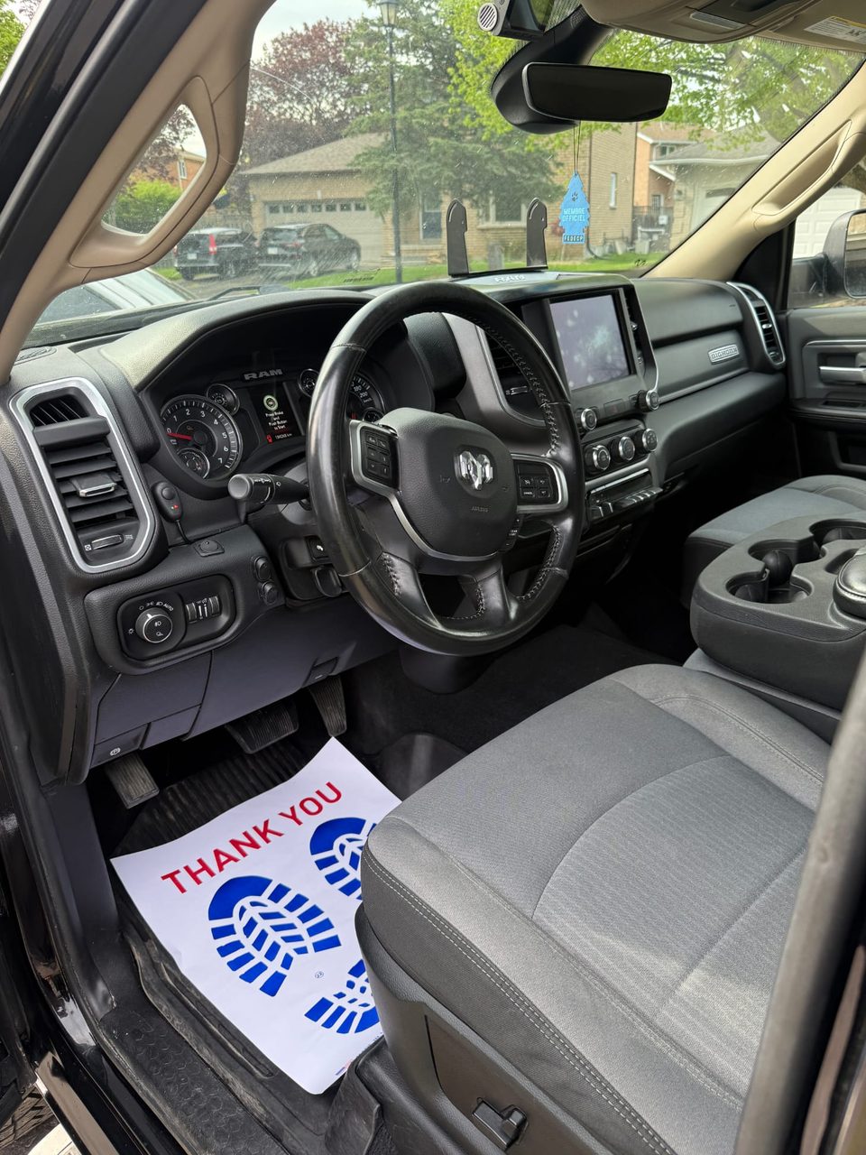 Ram pickup interior after detailing: clean floor and freshly cleaned cloth seats